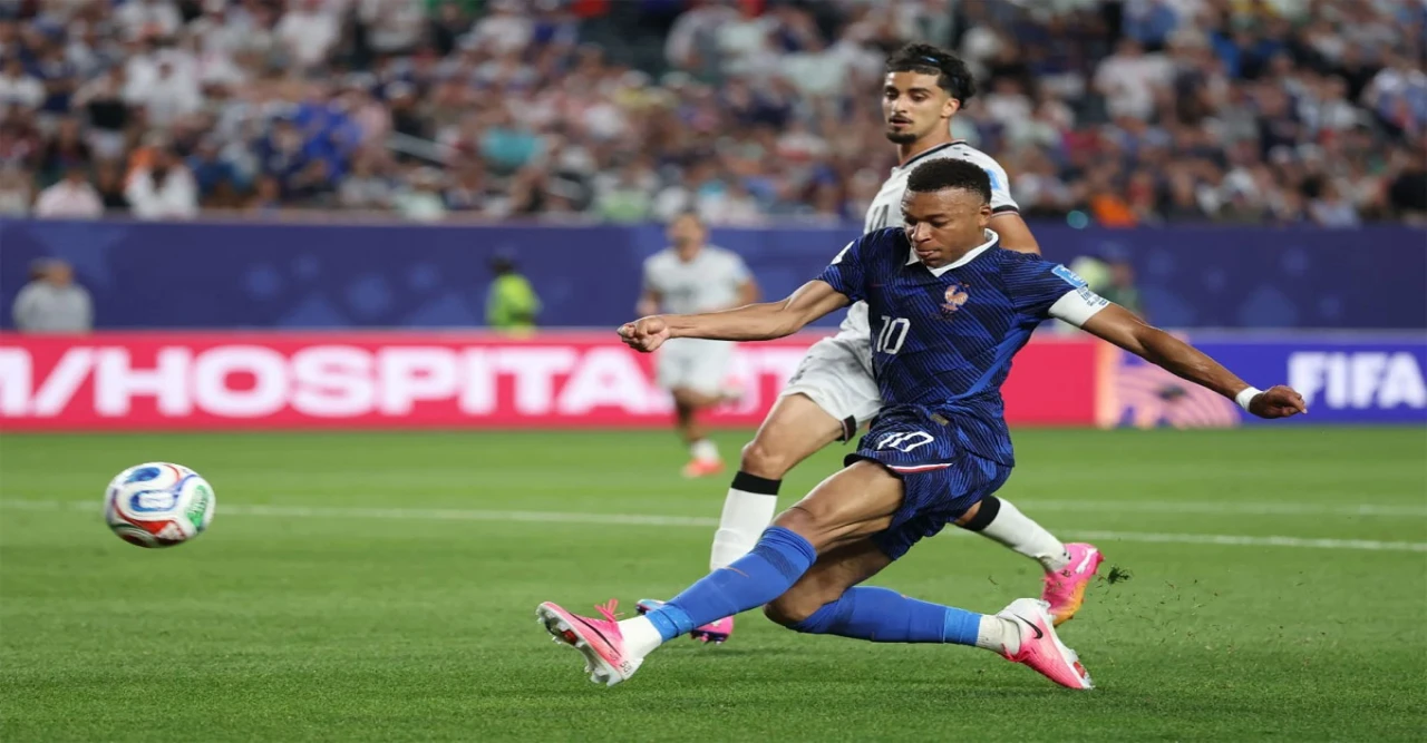 Kylian Mbappe's Historic Double Propels France to Round of 32 Despite Weather Chaos