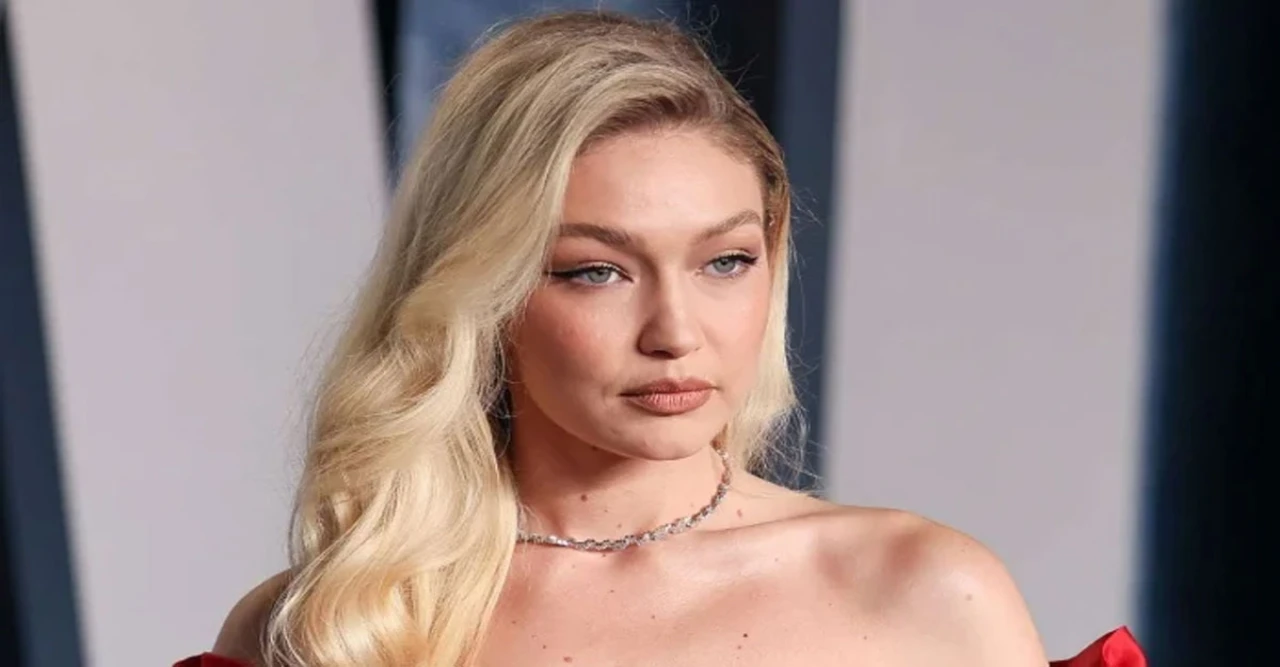 Supermodel Gigi Hadid Turns Heads in Flamingo-Pink Gown at Taylor Swift and Travis Kelce’s Star-Studded Wedding