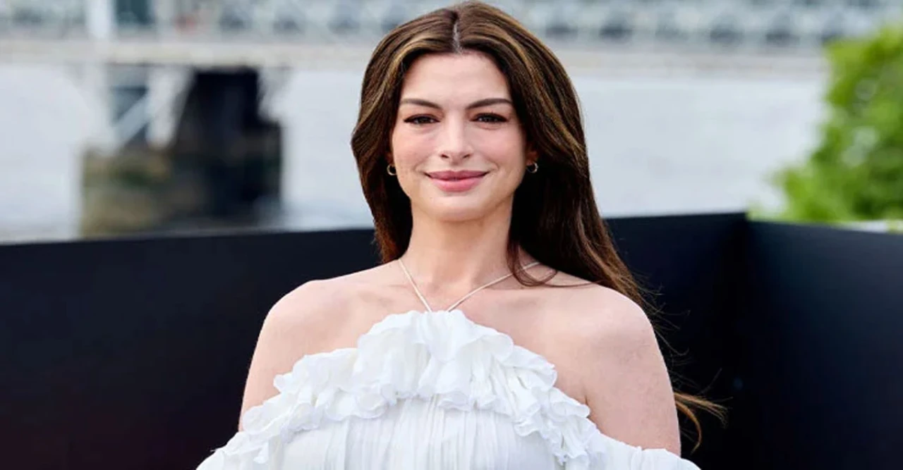 Anne Hathaway Sparks Baby Gender Buzz in Baby Blue at 'The Odyssey' Premiere
