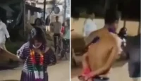 স্ত্রীকে পরপুরুষের সঙ্গে দেখে ক্ষিপ্ত স্বামী, রাস্তায় জুতার মালা পরিয়ে করলেন চরম অপমান!
