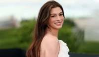Anne Hathaway Stuns at 'The Odyssey' Photocall While Glowing During Third Pregnancy