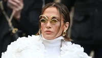 Jennifer Lopez Turns Heads in Cream Satin Following Taylor Swift’s Star-Studded Wedding