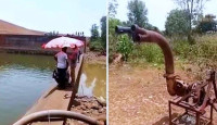 ফোন উদ্ধারে পানি সেচে ফেলা সেই সরকারি কর্মকর্তার ২১ লাখ টাকা জরিমানা