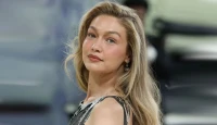 Gigi Hadid's Throwback Photo with Father Sparks 'Mini-Me' Comparisons to Daughter Khai